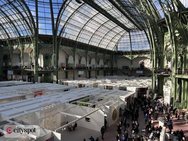 Inside the glass-and-steel nave of the Grand Palais during Art Basel Paris